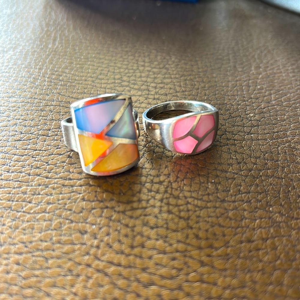 Sized about a 7 & 8, sterling silver, with stone/shell inlay.